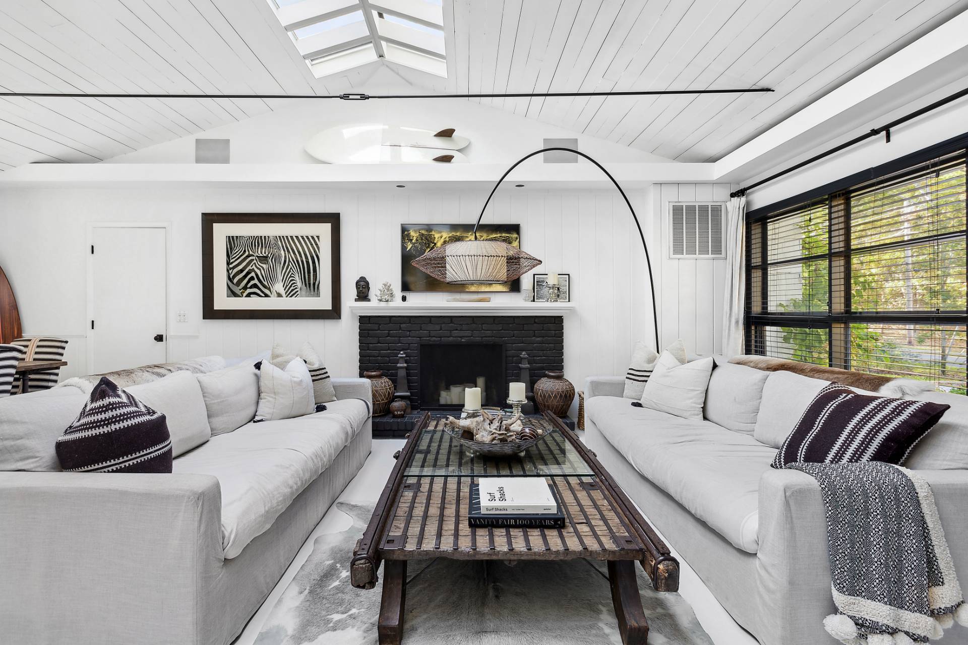 1510 Sagg Road Sag Harbor, NY 11963 - Photo 4 of 22 a living room with furniture fireplace and a large window