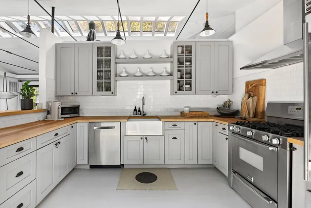 a bed room with a bed and a couch