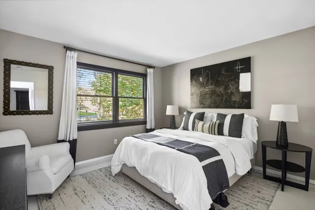 a bathroom with a sink double vanity and a mirror
