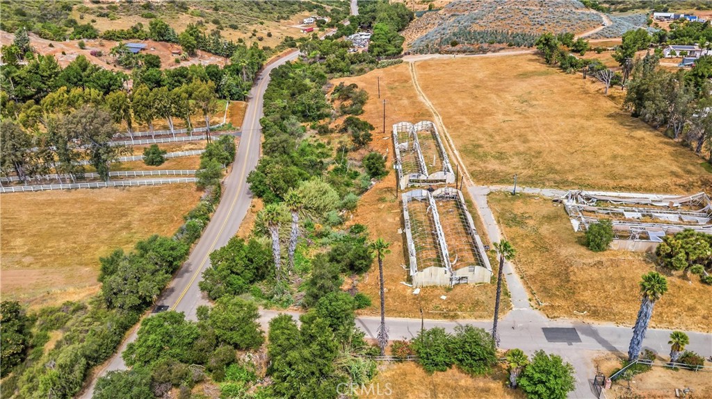 9104 Huntley Road Fallbrook, CA 92028 - Photo 3 of 14 an aerial view of a residential houses with yard