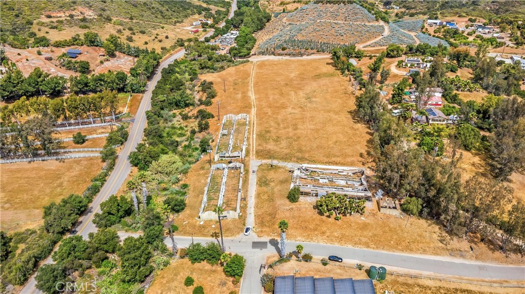 9104 Huntley Road Fallbrook, CA 92028 - Photo 5 of 14 an aerial view of residential houses with outdoor space