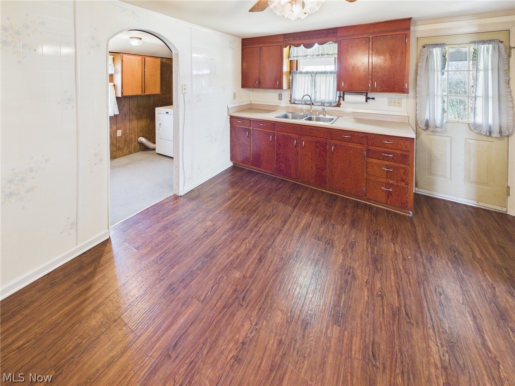 834 Lake Washington Road Washington, WV 26181 - Photo 6 of 20 Kitchen with light countertops, dark wood-type floors, ceiling fan, washer / dryer
