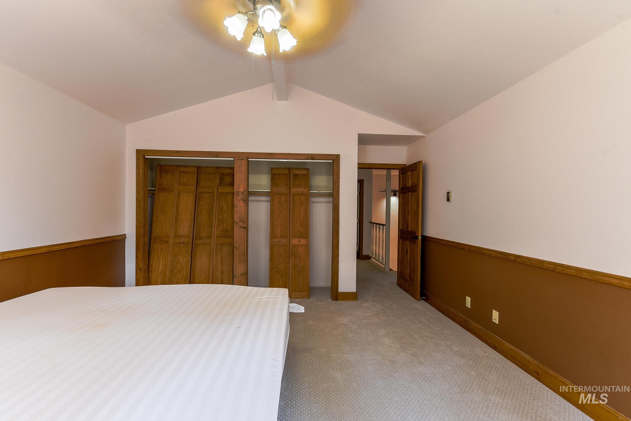 1045 Joyce Road Moscow, ID 83843 - Photo 25 of 50 Vaulted ceiling with an attached ceiling fan and light fixture