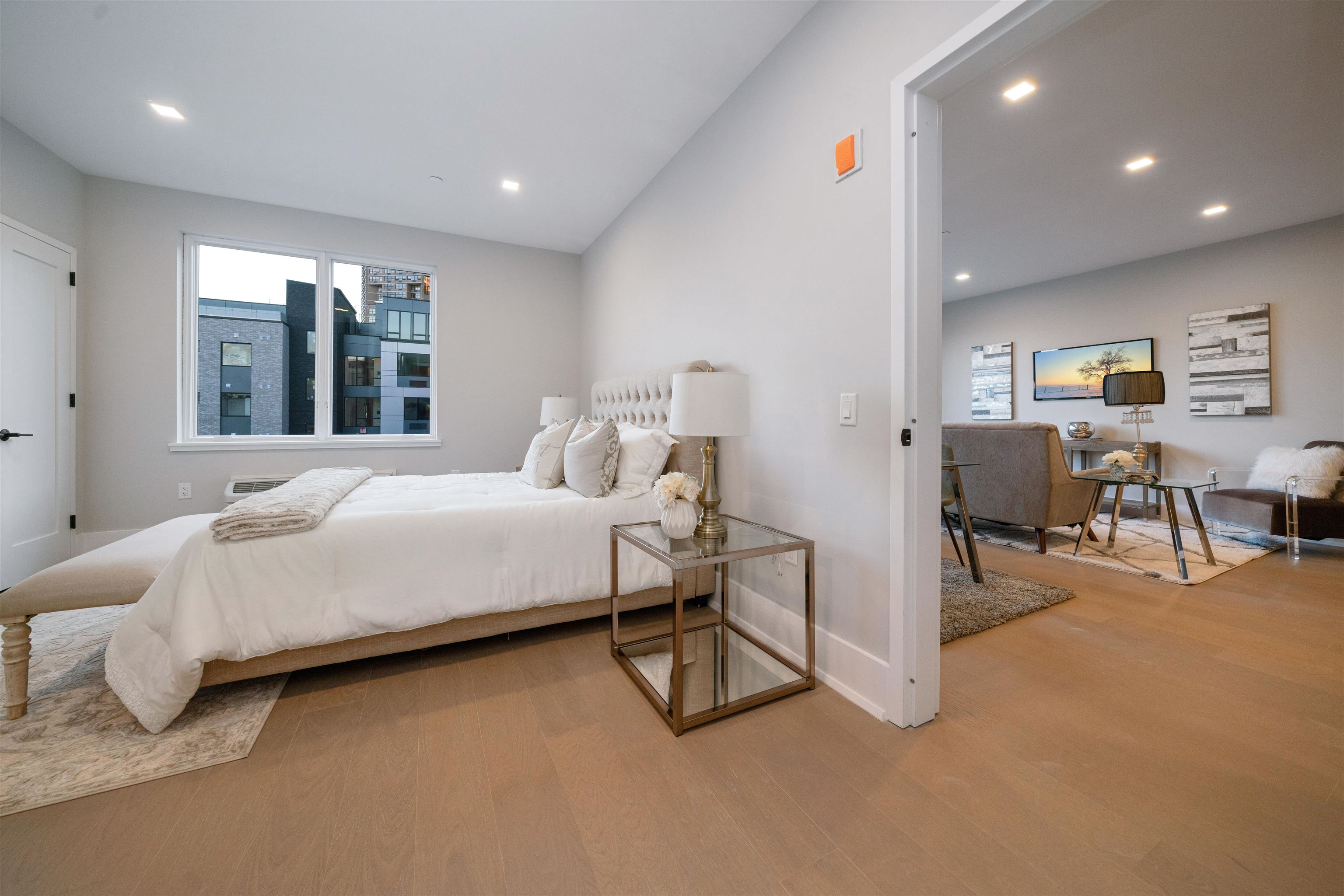 7101 River Road, Unit 310B North Bergen, NJ 07047 - Photo 22 of 36 a bedroom with furniture and a large window