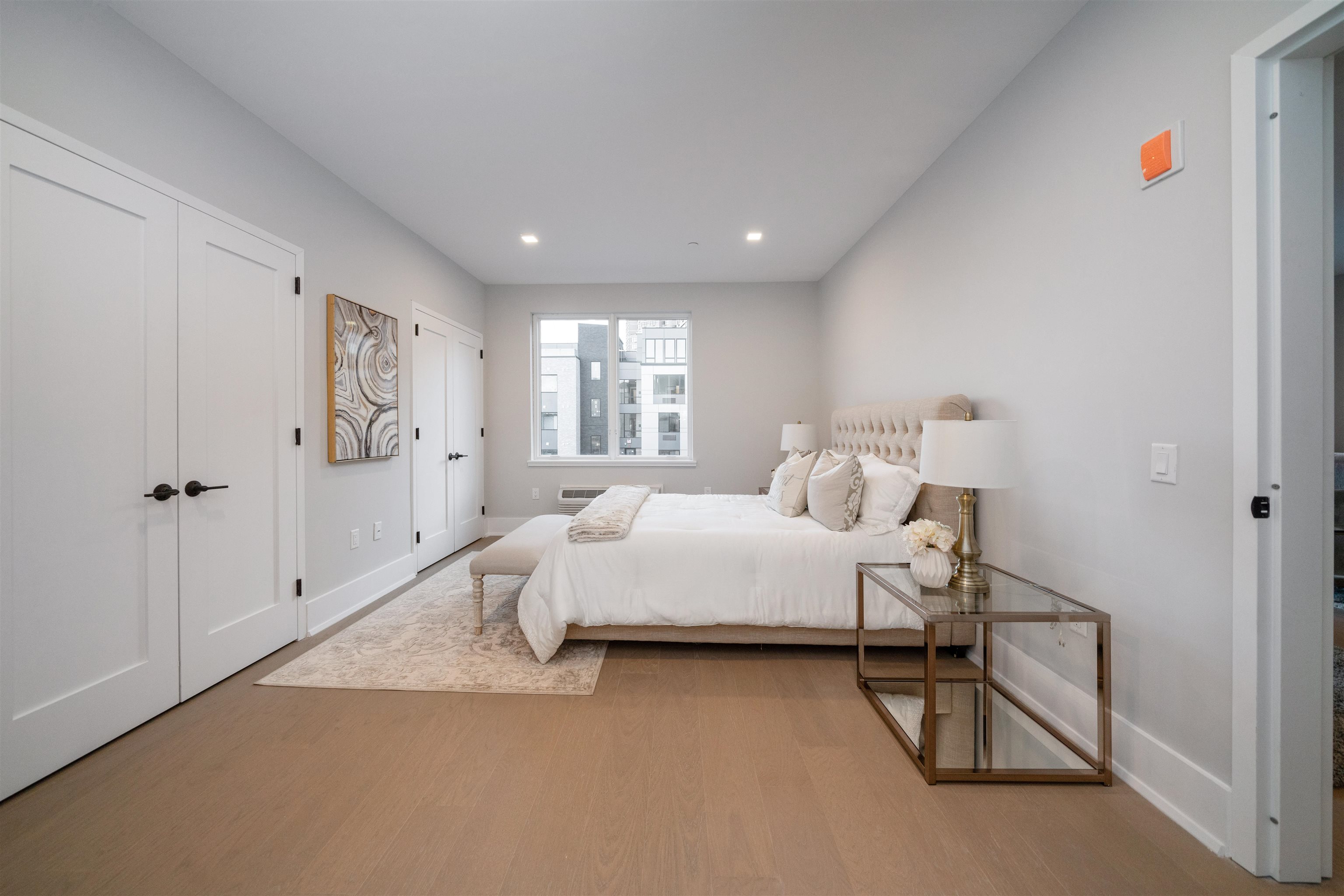 7101 River Road, Unit 310B North Bergen, NJ 07047 - Photo 23 of 36 a spacious bedroom with a bed and a table