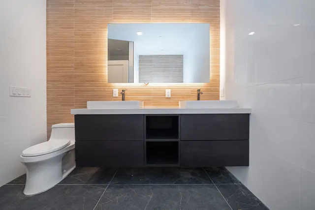 a bathroom with a sink and a toilet