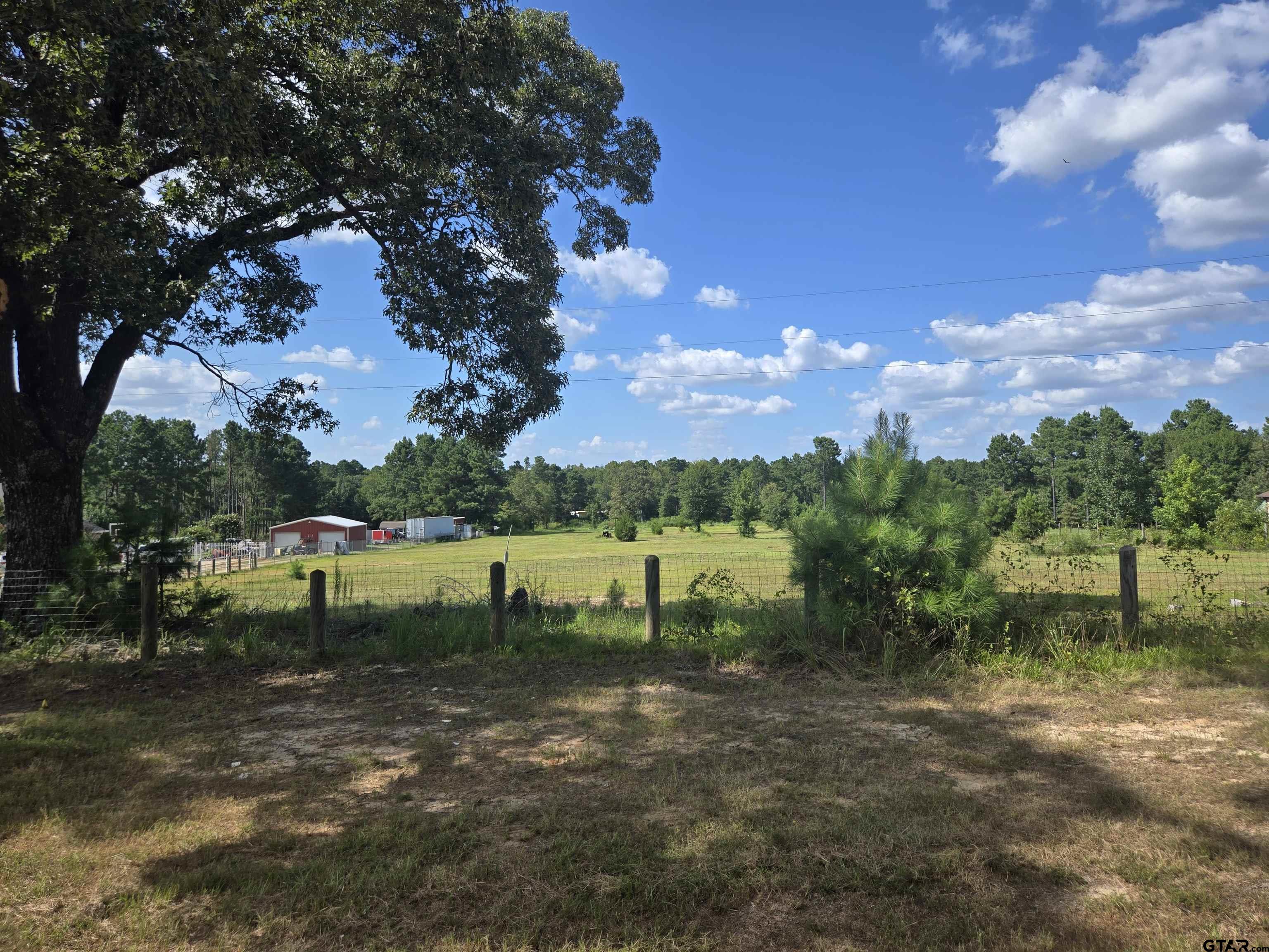 Tbd Fm Tbd Fm 2767th Tyler, TX 75705 - Photo 4 of 7 a view of a lake with a yard