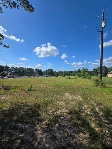a view of an outdoor space and a yard