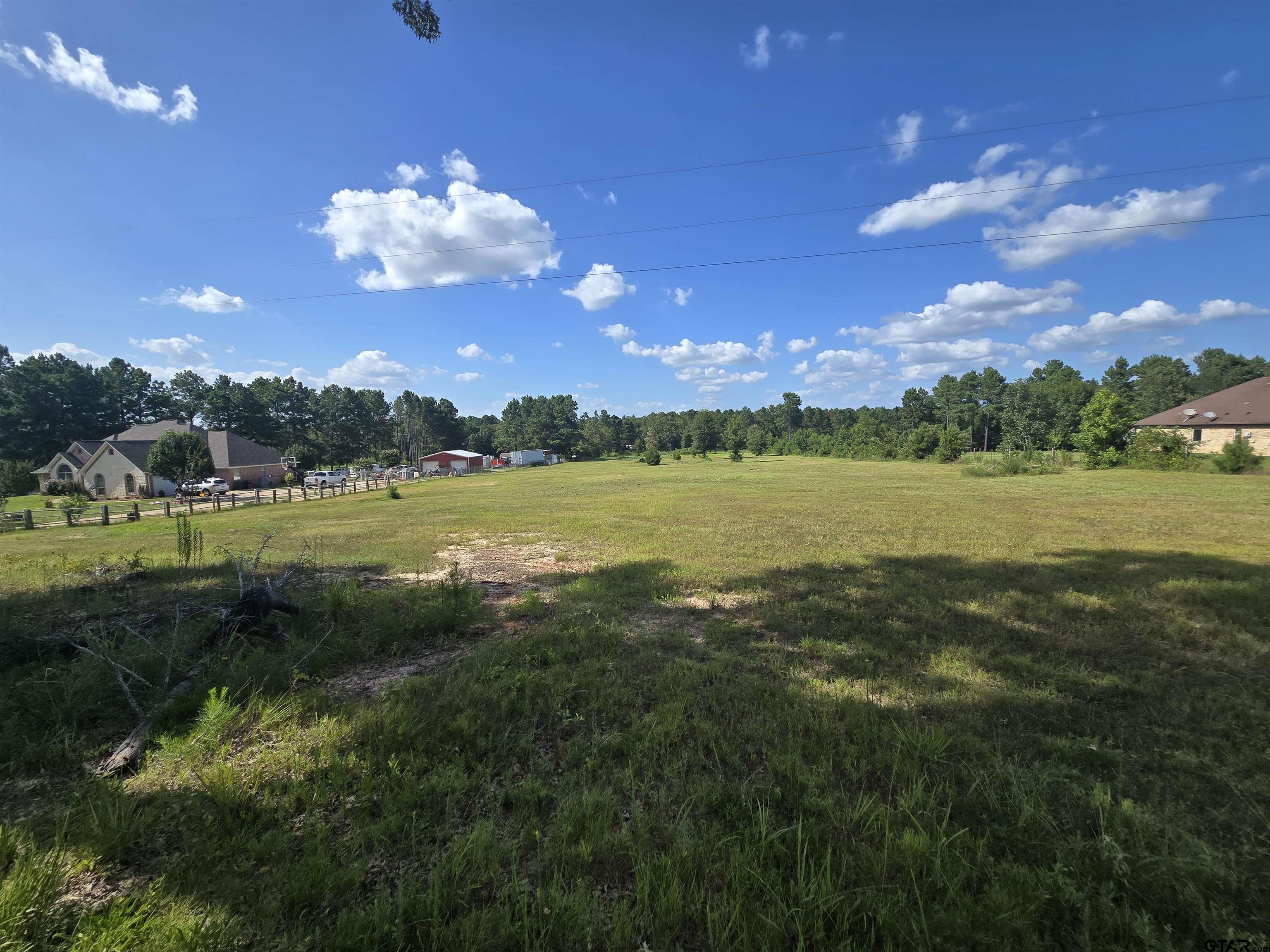 Tbd Fm Tbd Fm 2767th Tyler, TX 75705 - Photo 7 of 7 a view of a lake and green yard