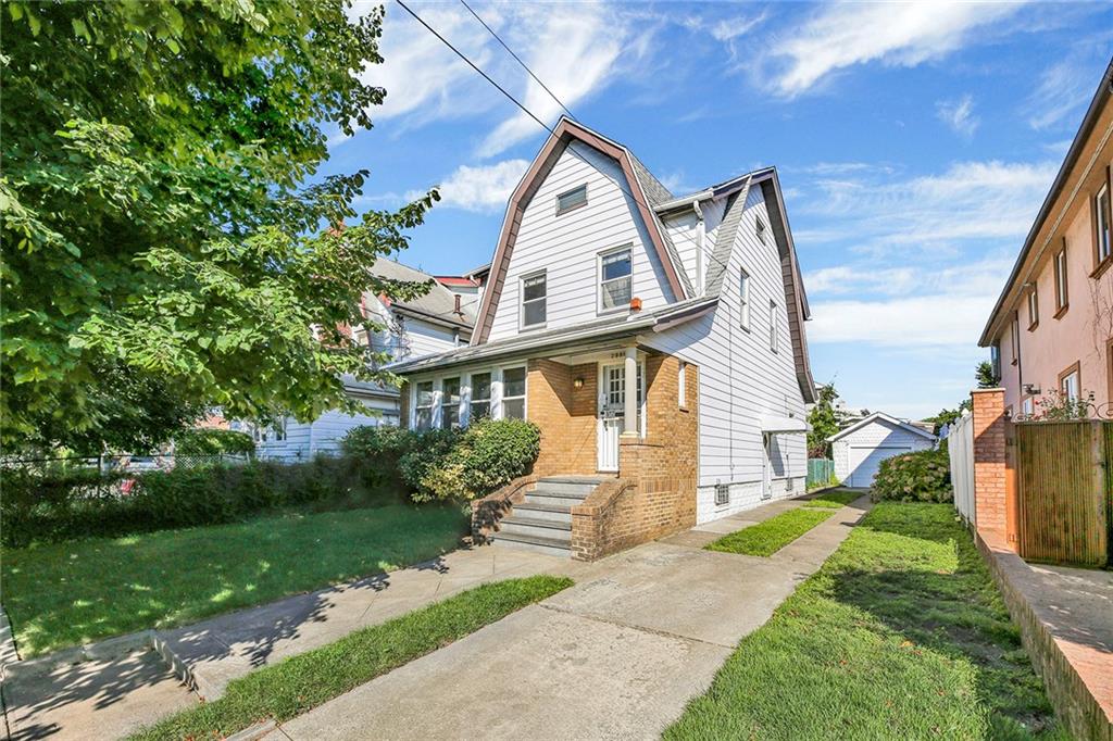 2991 Quentin Road Brooklyn, NY 11229 - Photo 1 of 30 a view of a house with a yard