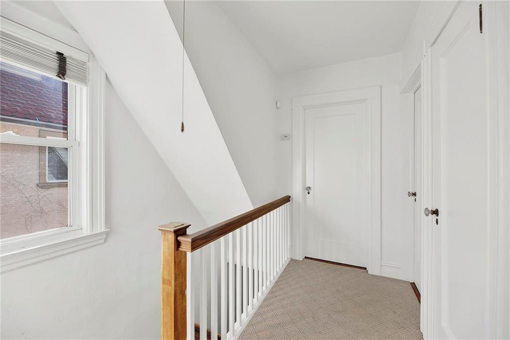 2991 Quentin Road Brooklyn, NY 11229 - Photo 15 of 30 a view of a hallway with stairs