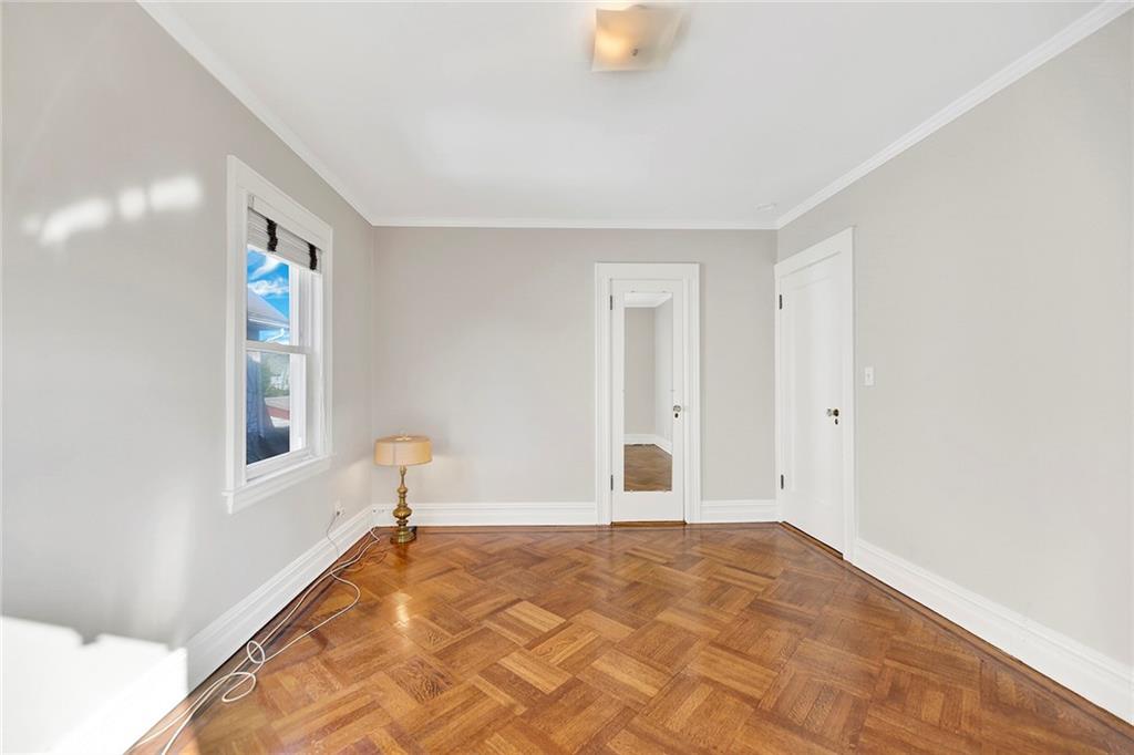 2991 Quentin Road Brooklyn, NY 11229 - Photo 17 of 30 a view of empty room with wooden floor