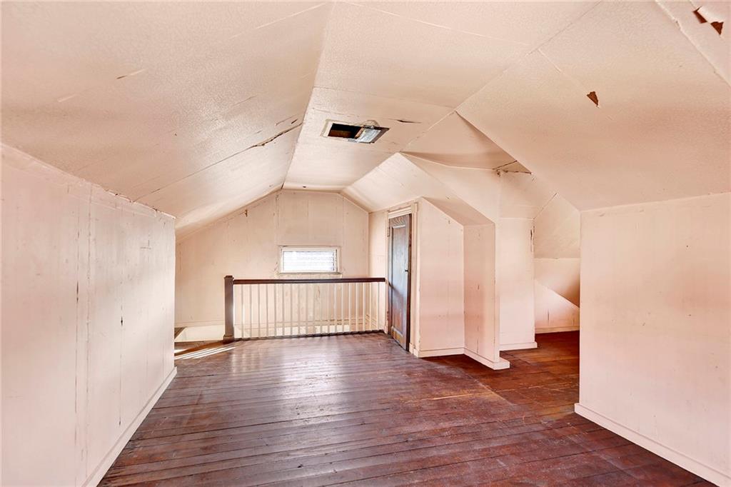 2991 Quentin Road Brooklyn, NY 11229 - Photo 23 of 30 a view of empty room with wooden floor