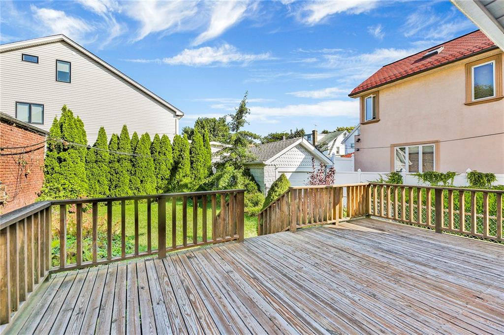 2991 Quentin Road Brooklyn, NY 11229 - Photo 25 of 30 a view of a house with wooden deck