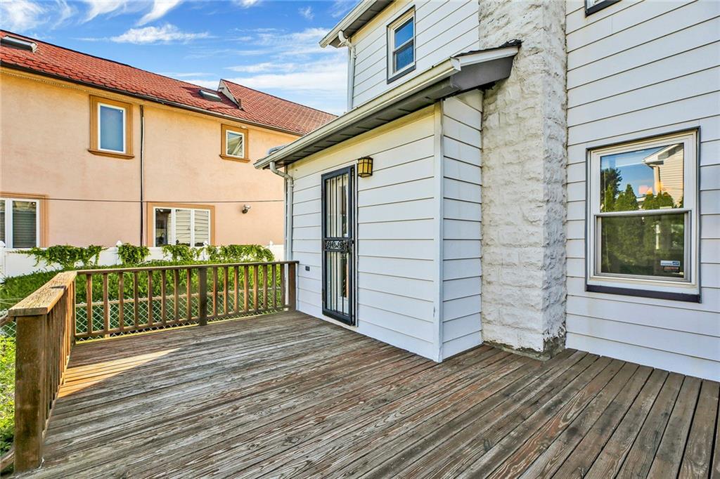 2991 Quentin Road Brooklyn, NY 11229 - Photo 26 of 30 a view of a house with wooden fence