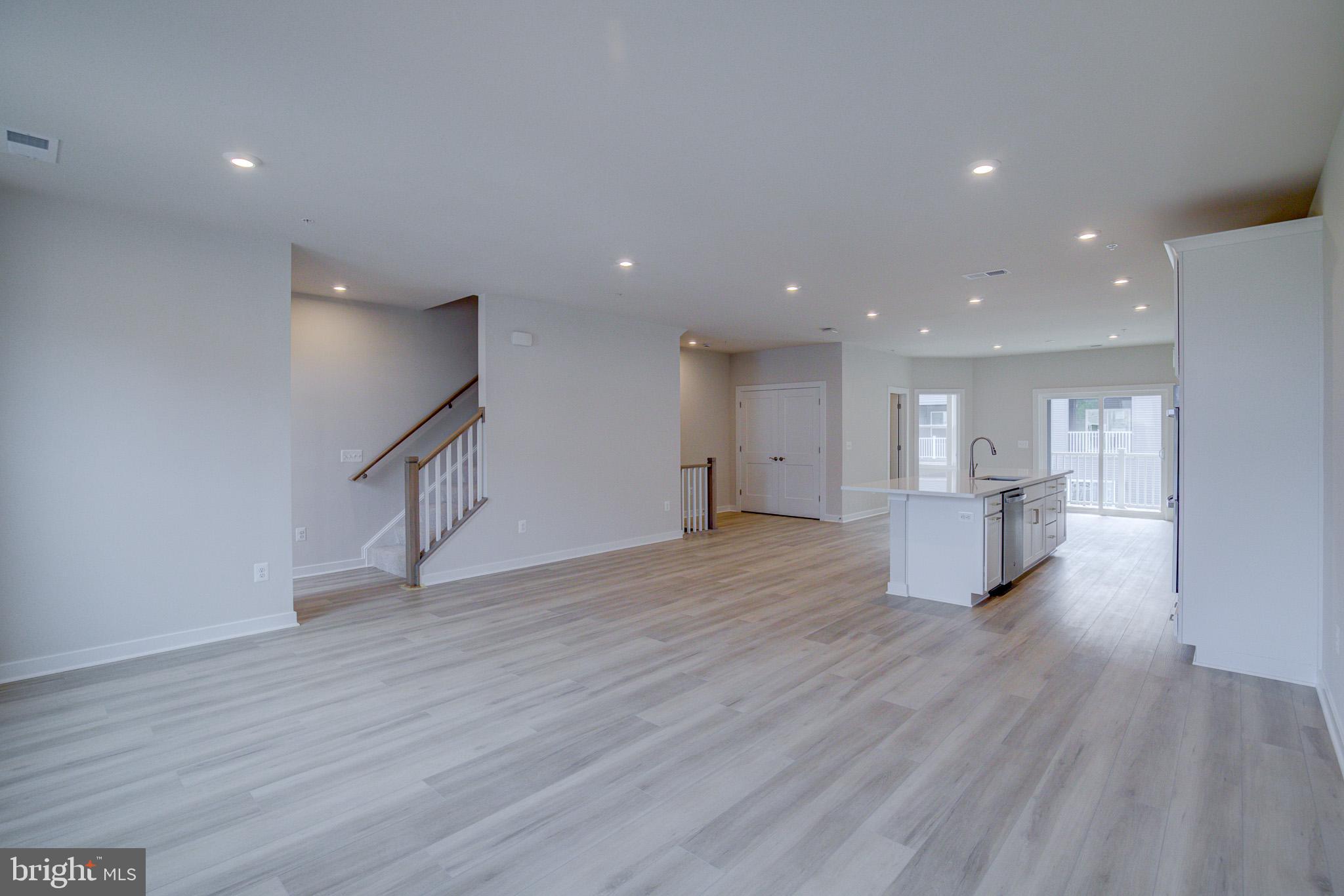 14138 Gypsum Loop Chantilly, VA 20151 - Photo 12 of 36 Luxury Vinyl & Recessed Lighting on Main Level!