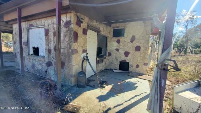 a view of backyard of house