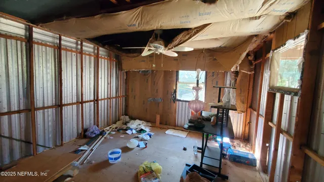 a bathroom with a tub and shower