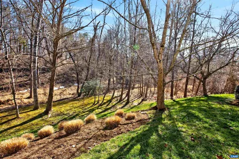 a view of outdoor space with deck and garden