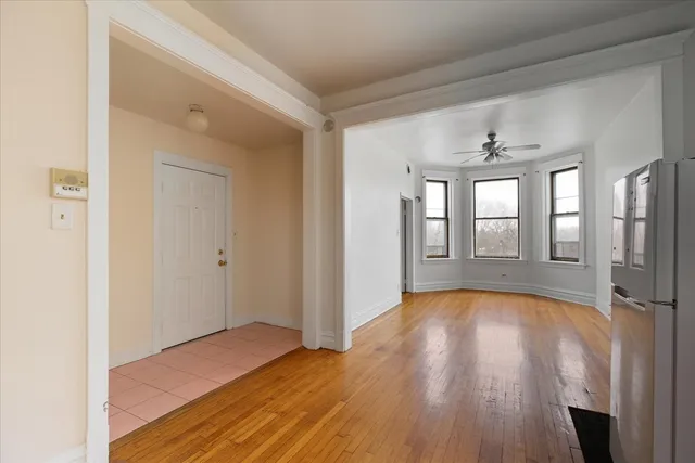 a view of livingroom with hardwood floor and hallway