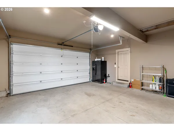 a room with furniture and a flat screen tv