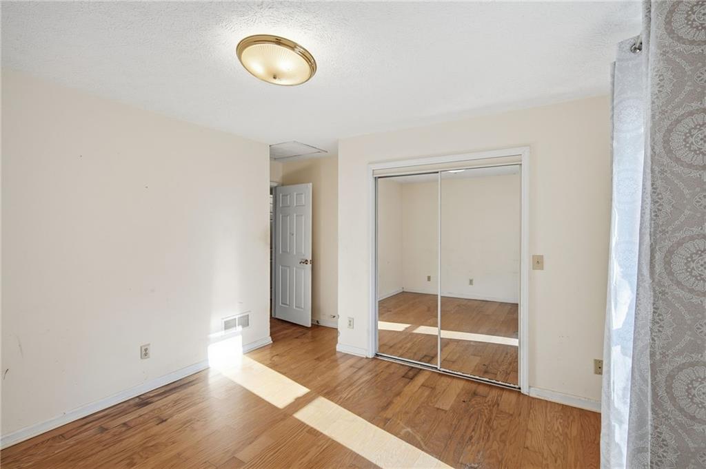 655 Kelley Road Cleveland, GA 30528 - Photo 21 of 41 a view of a room with wooden floor and window