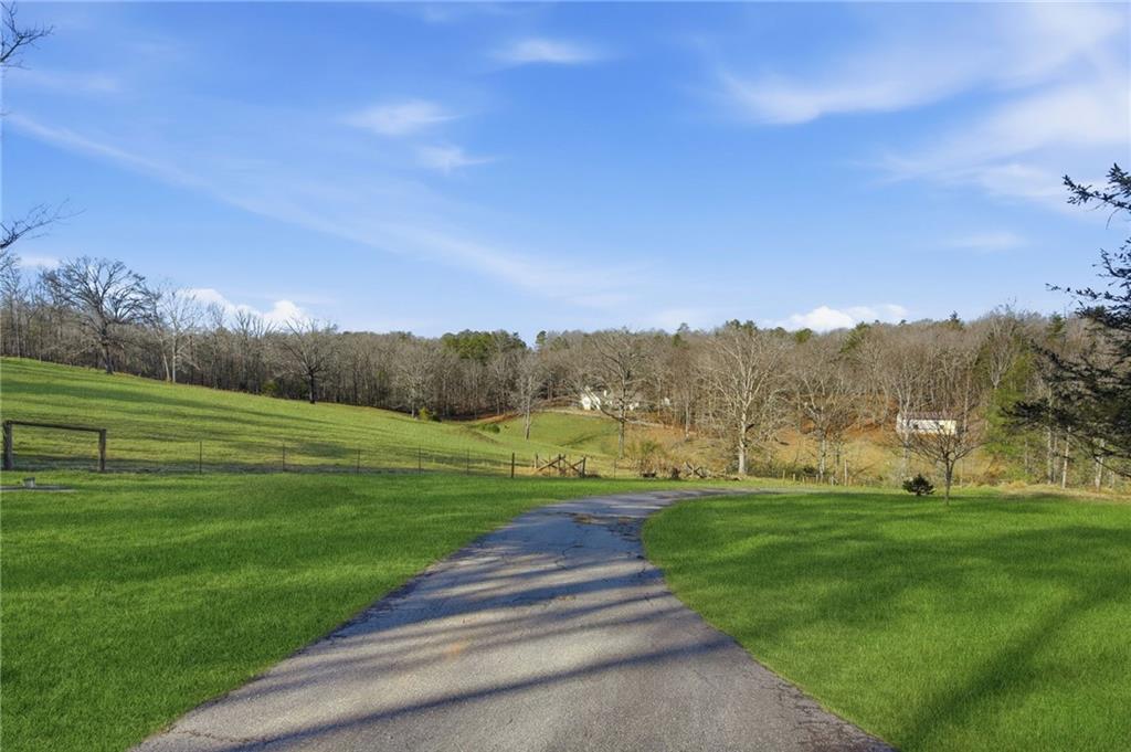 655 Kelley Road Cleveland, GA 30528 - Photo 35 of 41 a view of grassy field with mountain
