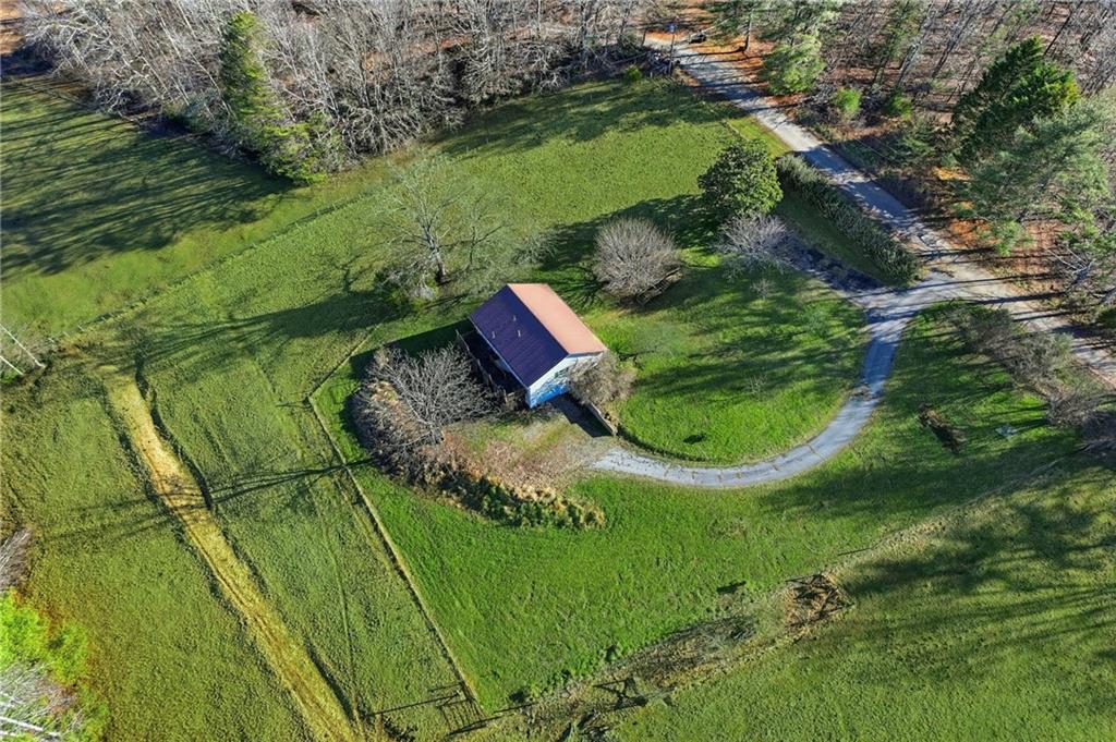 655 Kelley Road Cleveland, GA 30528 - Photo 38 of 41 an aerial view of a golf course with swimming pool