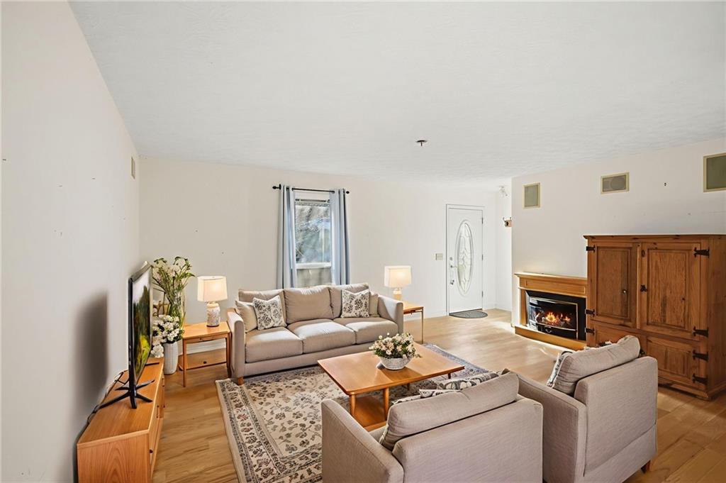 655 Kelley Road Cleveland, GA 30528 - Photo 7 of 41 a living room with furniture and a fireplace