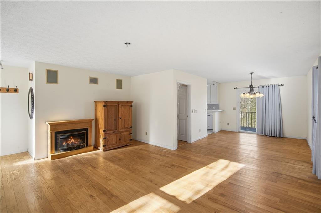 655 Kelley Road Cleveland, GA 30528 - Photo 8 of 41 a view of a livingroom with a fireplace and window