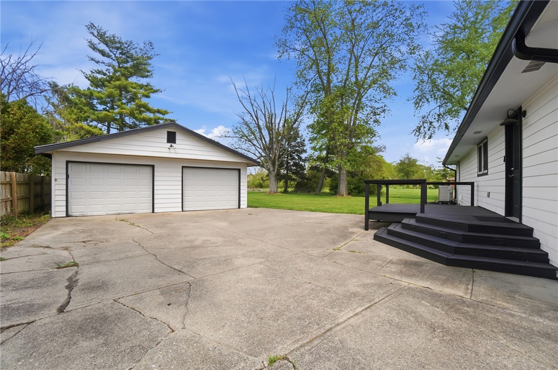 3991 Benner Road Miamisburg, OH 45342 - Photo 37 of 44 This property features a spacious detached garage and a large concrete driveway for ample parking.