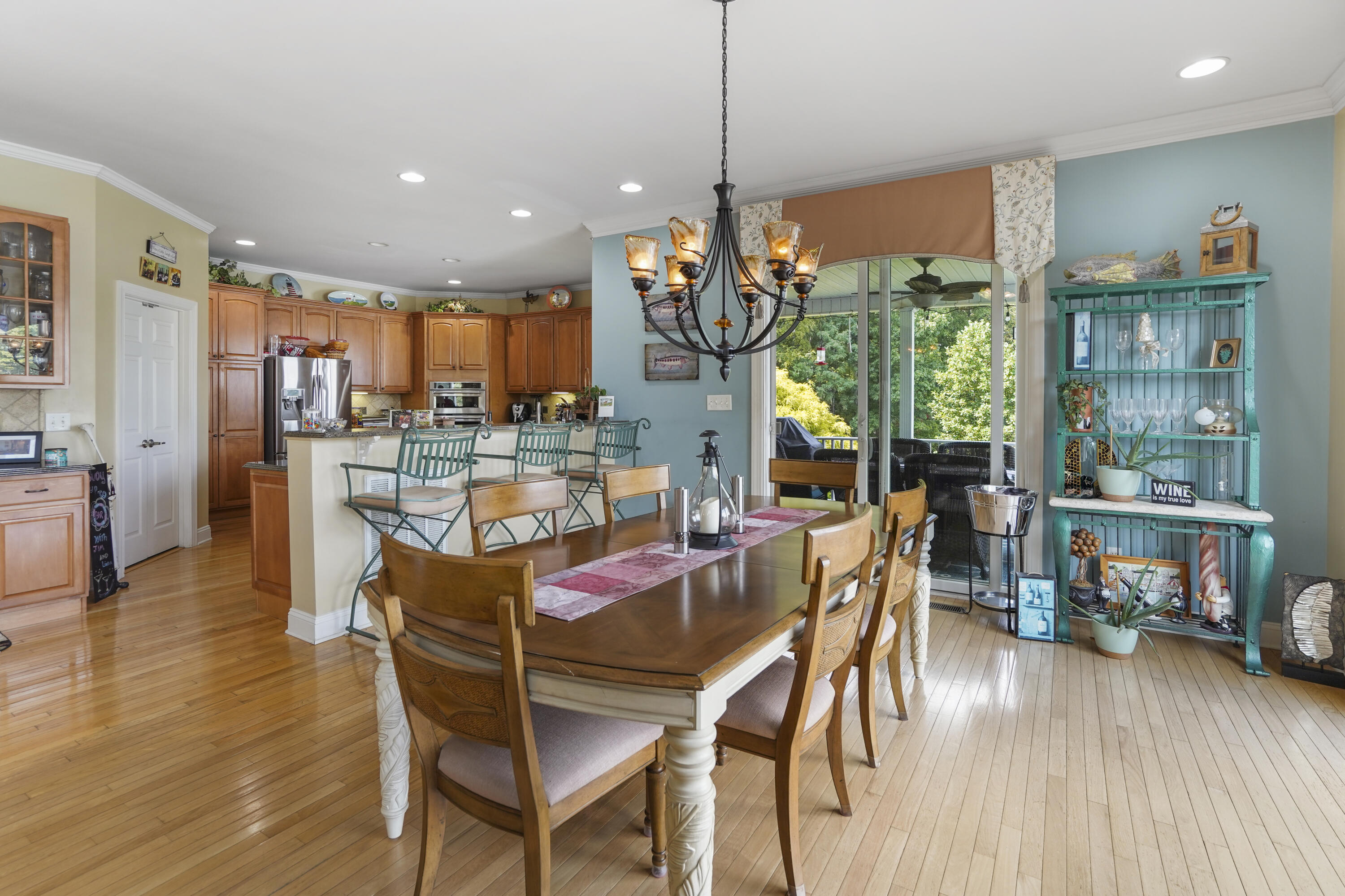 544 Wood Brook Road Moneta, VA 24121 - Photo 17 of 66 a view of a dining room with furniture window and wooden floor