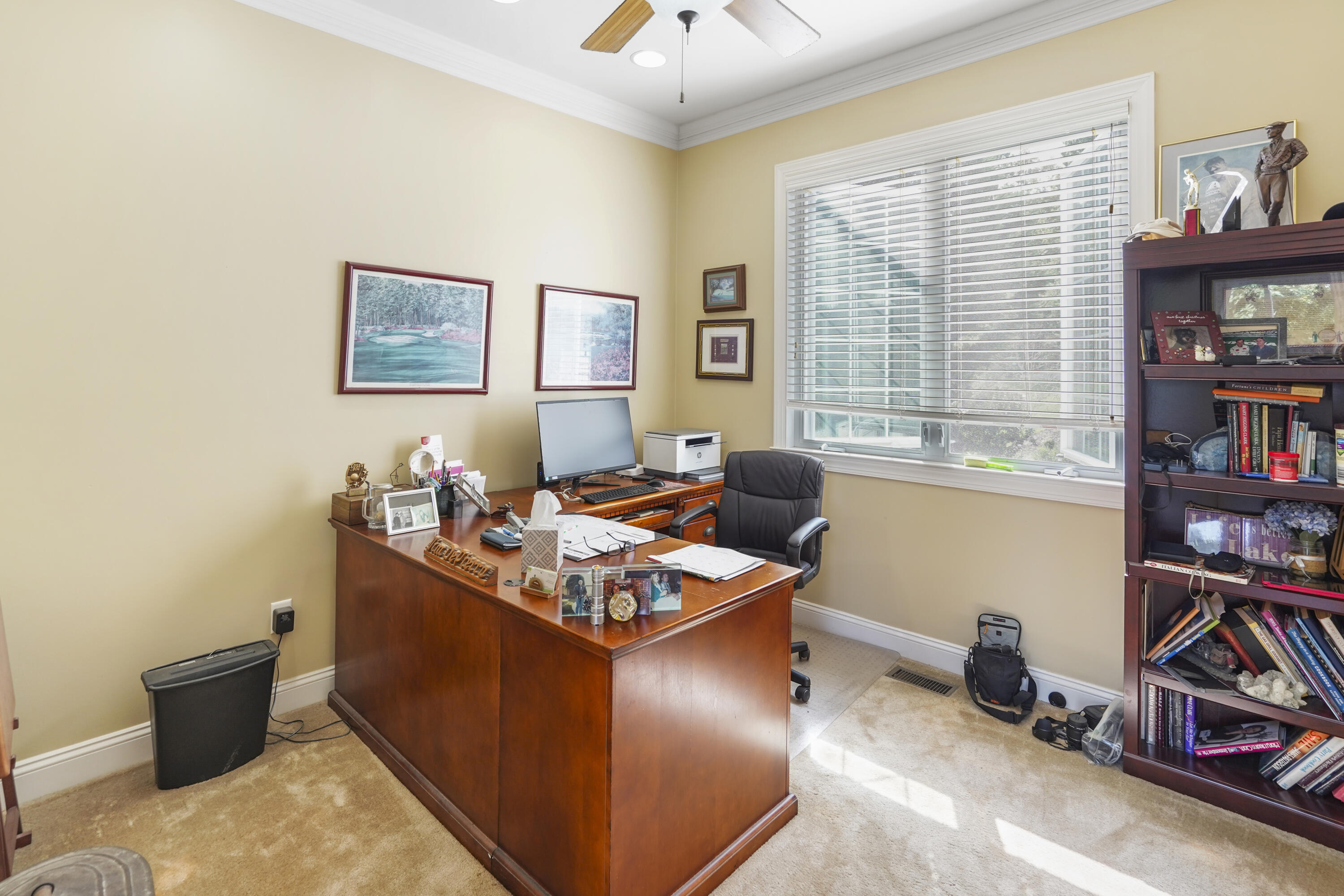544 Wood Brook Road Moneta, VA 24121 - Photo 24 of 66 a living room with furniture a bookshelf and a window