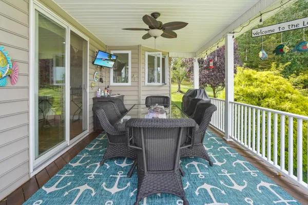 a living room with furniture and a table