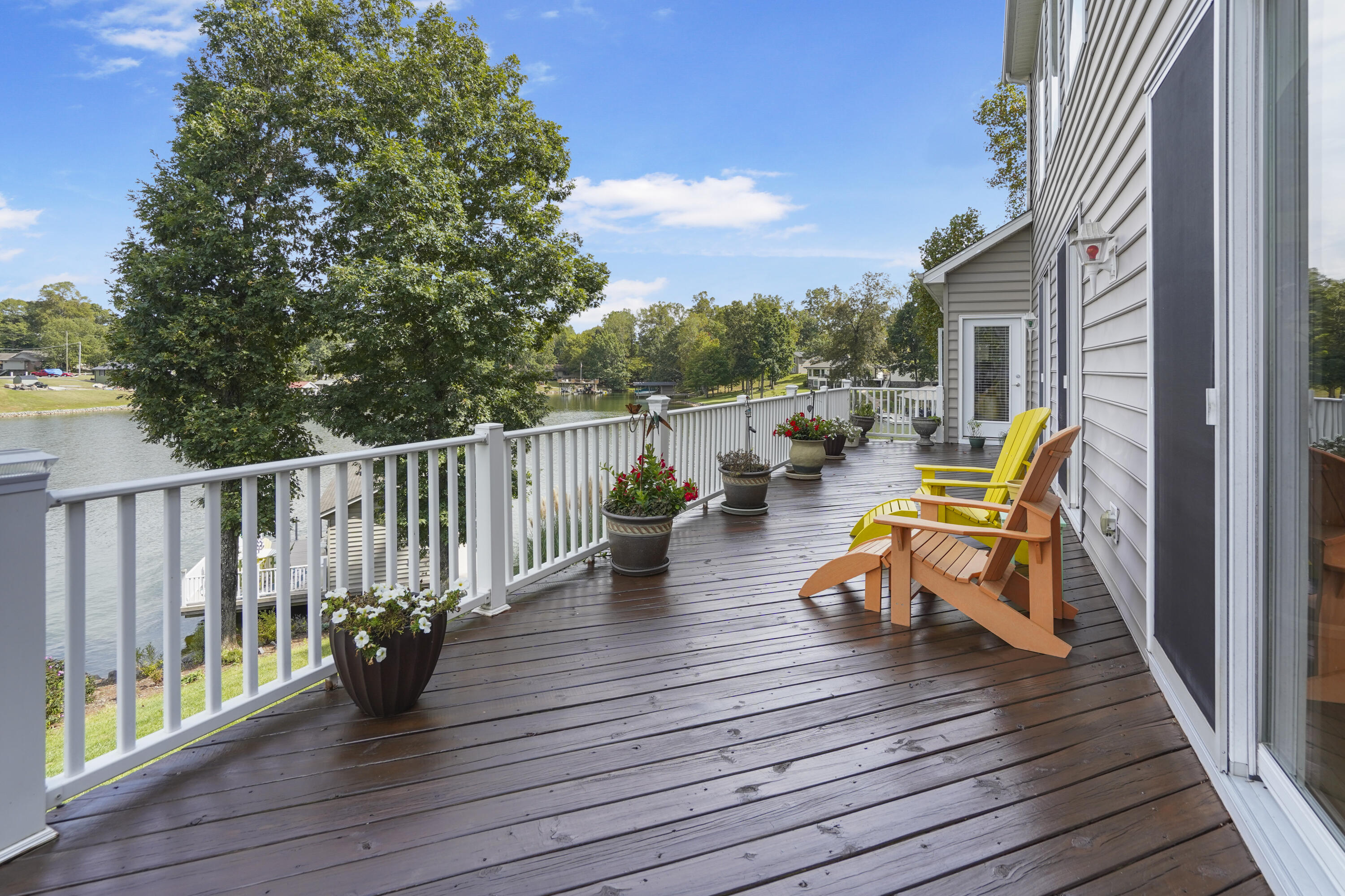 544 Wood Brook Road Moneta, VA 24121 - Photo 27 of 66 a view of a deck with chairs and wooden floor