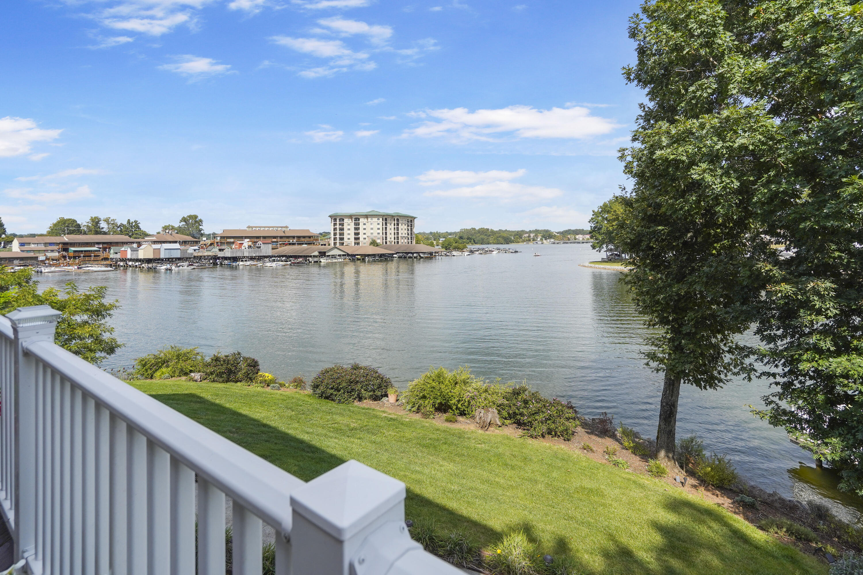 544 Wood Brook Road Moneta, VA 24121 - Photo 29 of 66 a view of a lake with a garden