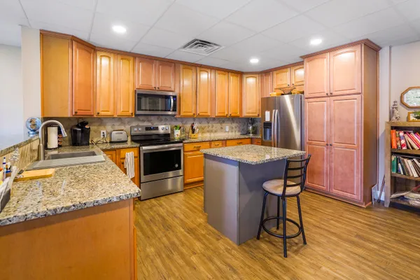 a bed room with a bed and a television