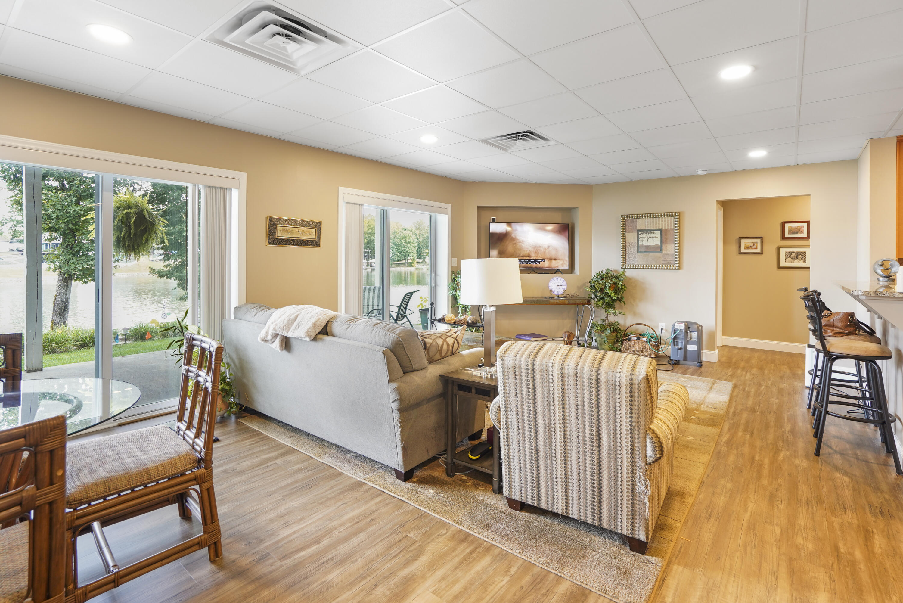 544 Wood Brook Road Moneta, VA 24121 - Photo 46 of 66 a living room with furniture and a wooden floor