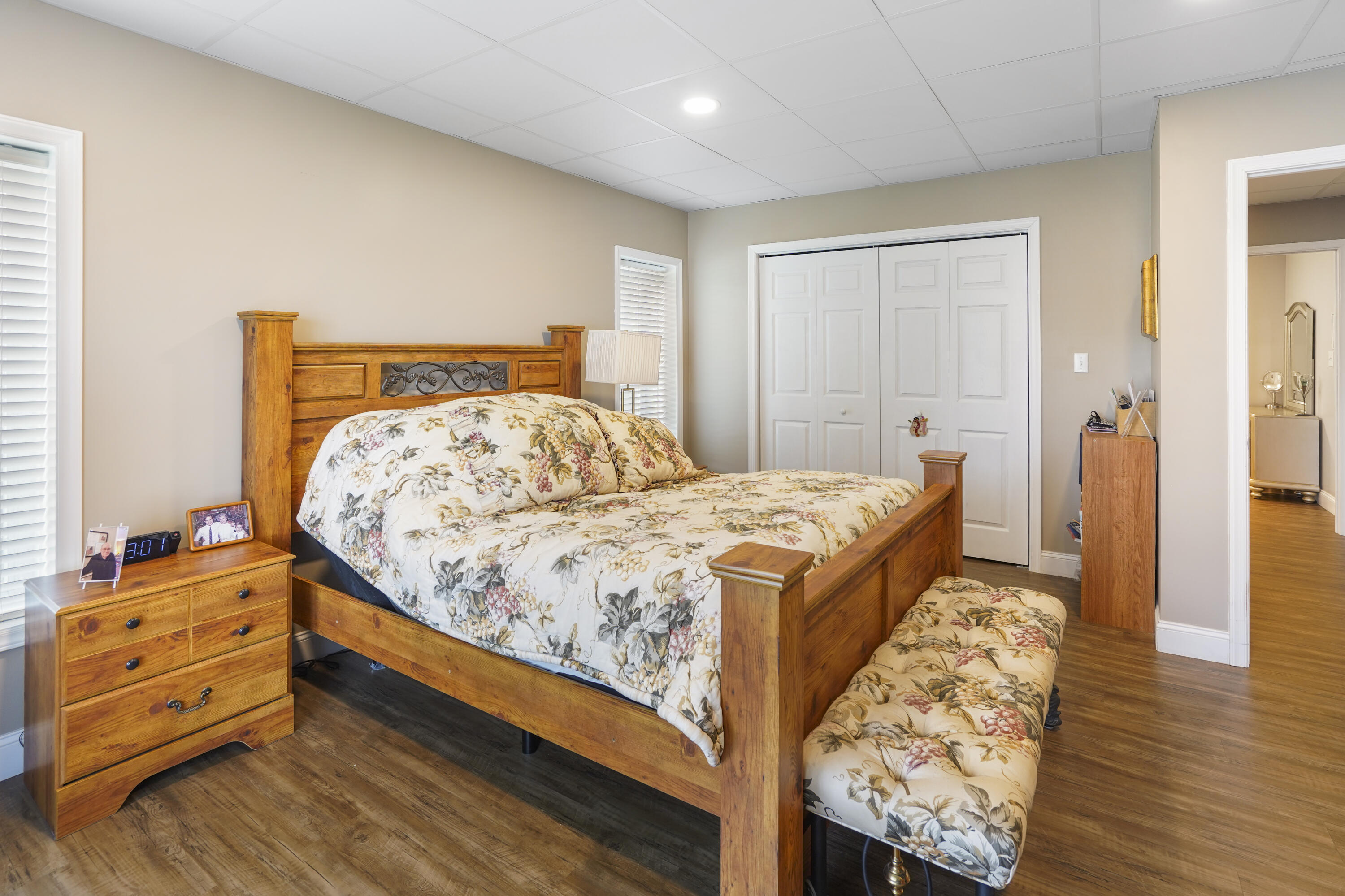 544 Wood Brook Road Moneta, VA 24121 - Photo 49 of 66 a bedroom with a bed and wooden floor