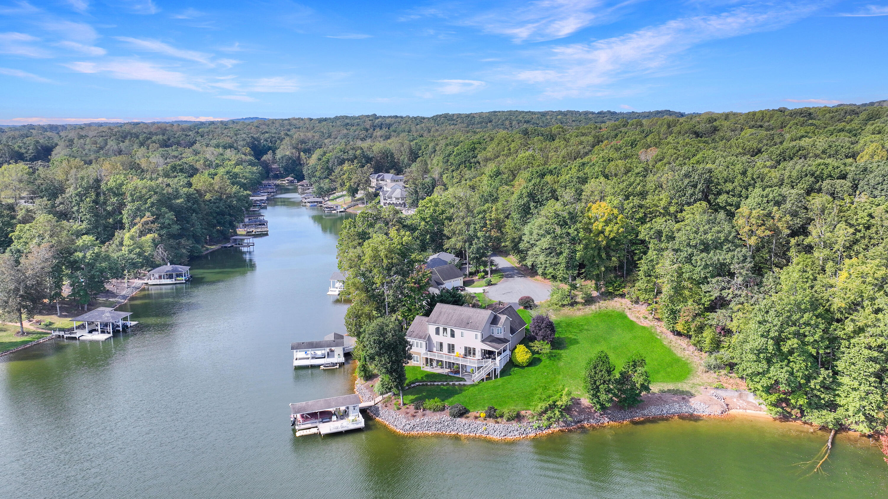 544 Wood Brook Road Moneta, VA 24121 - Photo 5 of 66 an aerial view of lake residential house with outdoor space and trees all around