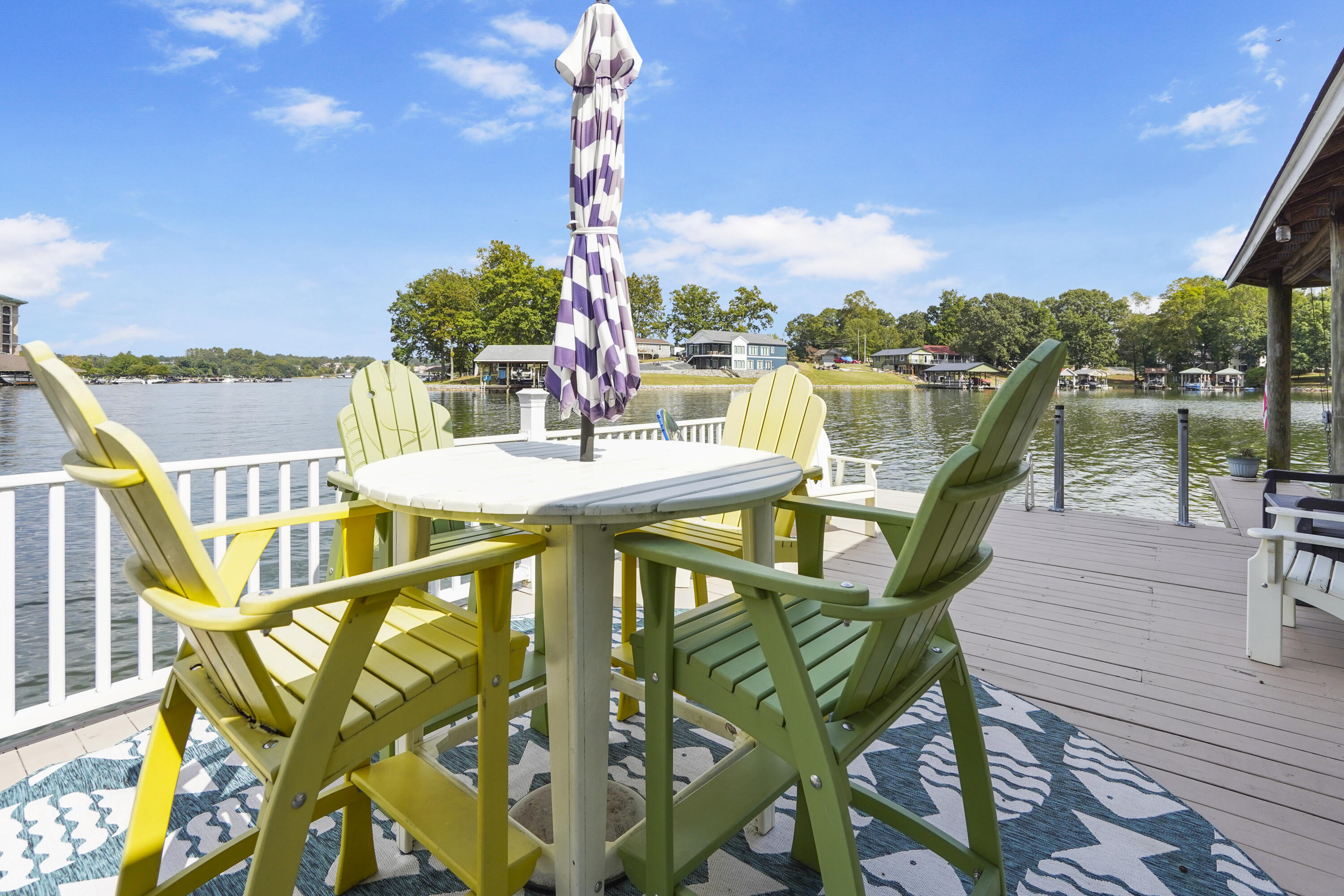 544 Wood Brook Road Moneta, VA 24121 - Photo 59 of 66 a view of a balcony with lake view and wooden floor