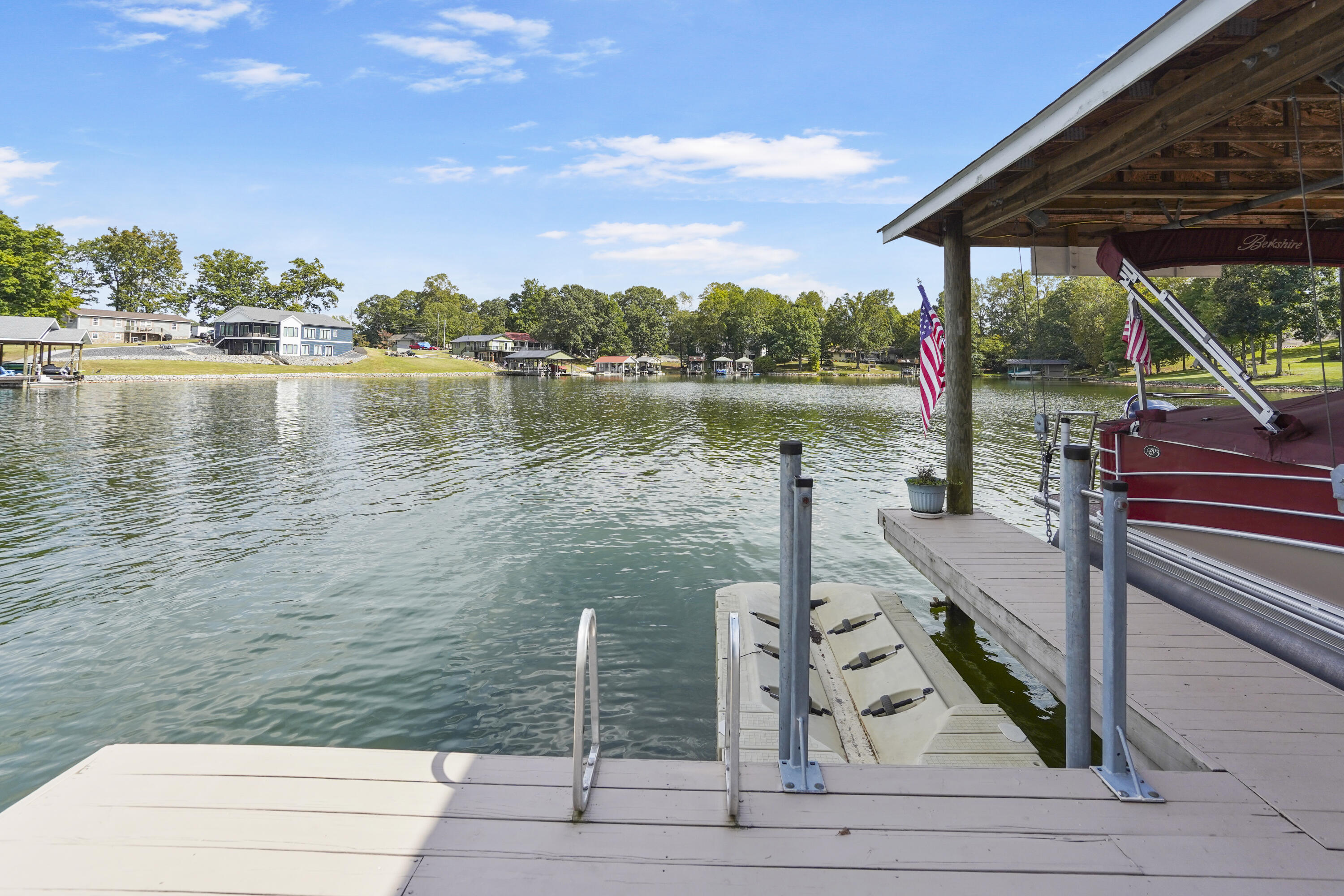 544 Wood Brook Road Moneta, VA 24121 - Photo 60 of 66 a view of a lake with wooden floor and outdoor space