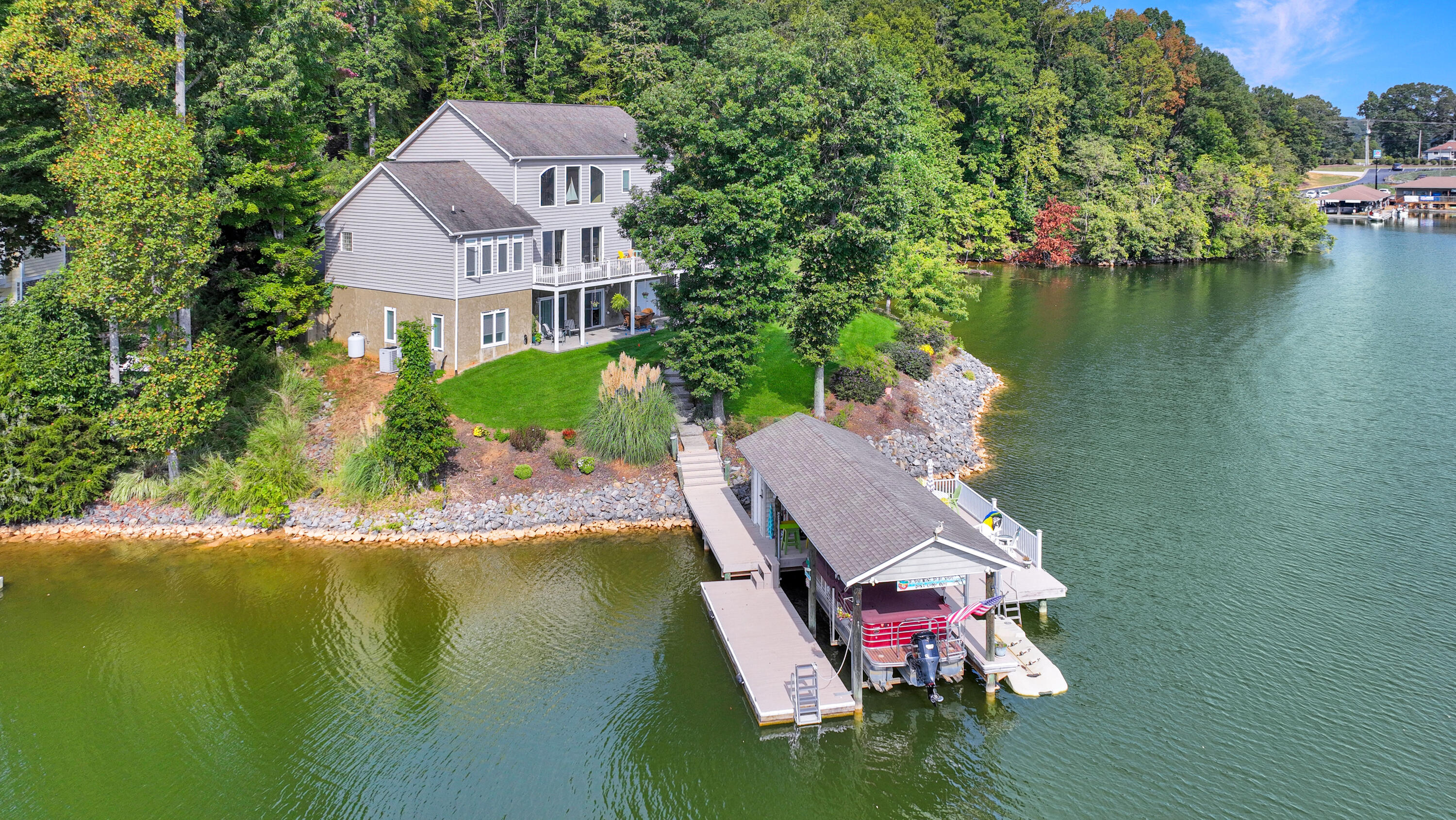 544 Wood Brook Road Moneta, VA 24121 - Photo 62 of 66 an aerial view of a house with swimming pool and lake view