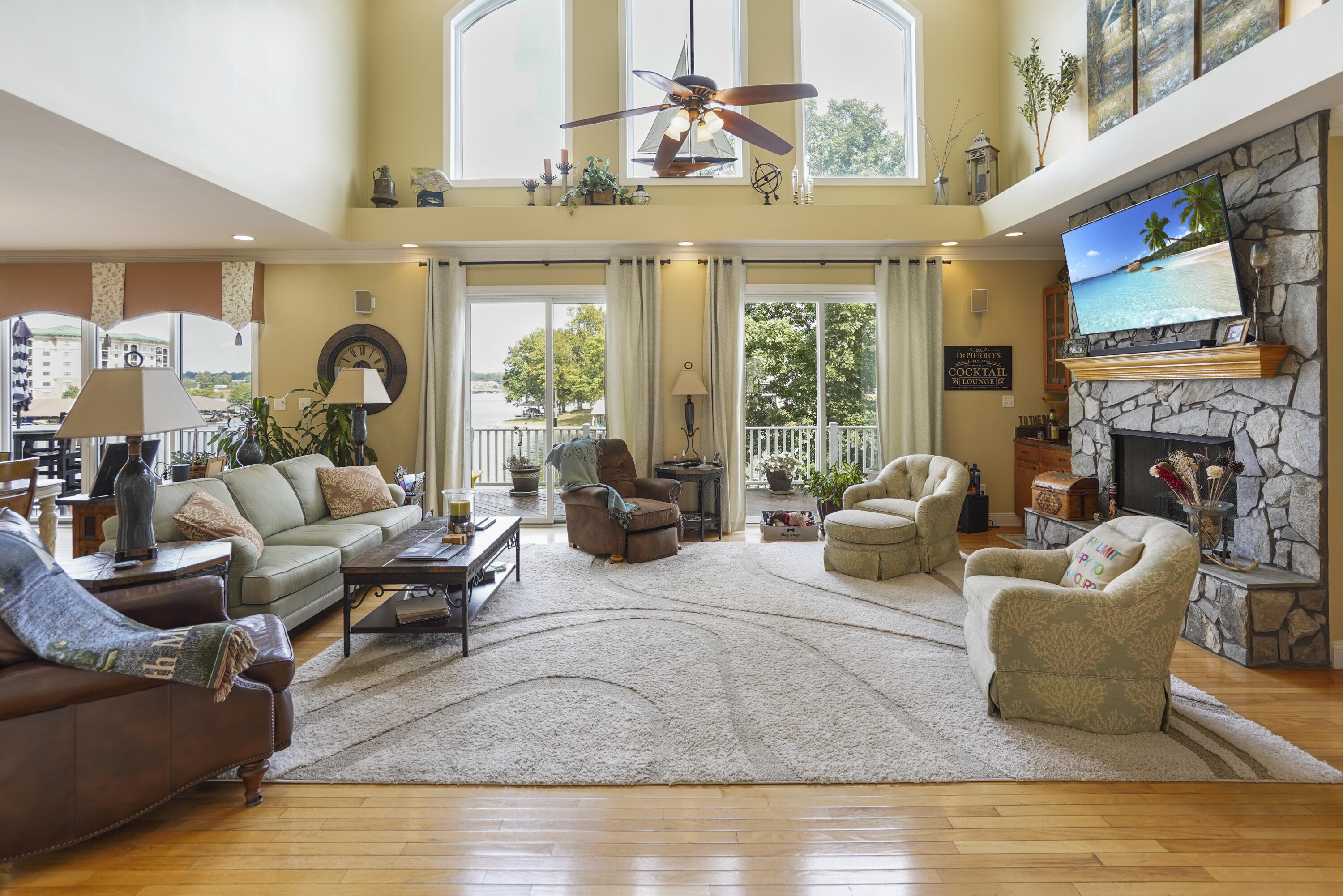 544 Wood Brook Road Moneta, VA 24121 - Photo 7 of 66 a living room with furniture fireplace and a large window