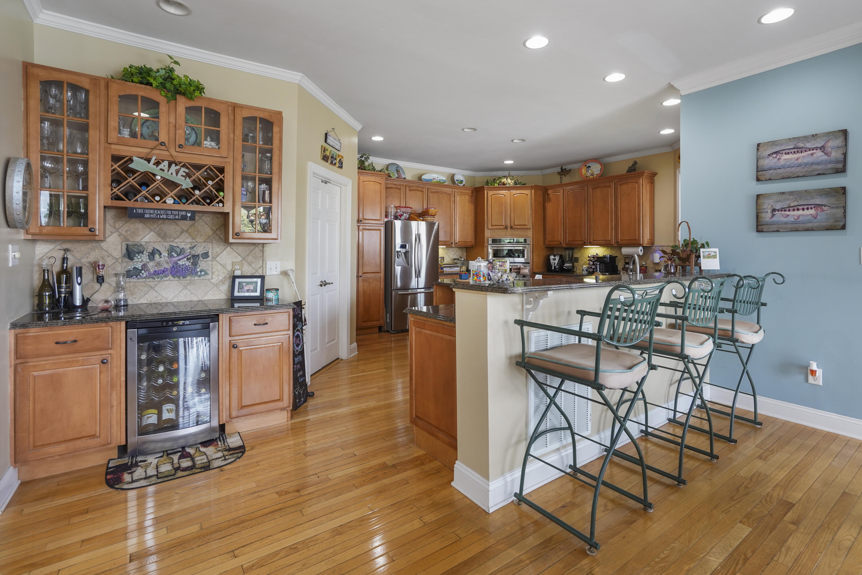 544 Wood Brook Road Moneta, VA 24121 - Photo 9 of 66 a very nice looking living room with dining room and wooden floor