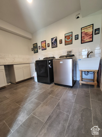 1406 South Bartholomew Cyn Road Springville, UT 84663 - Photo 13 of 19 Laundry area with washer / clothes dryer, tile walls, a wainscoted wall, and dark tile patterned floors
