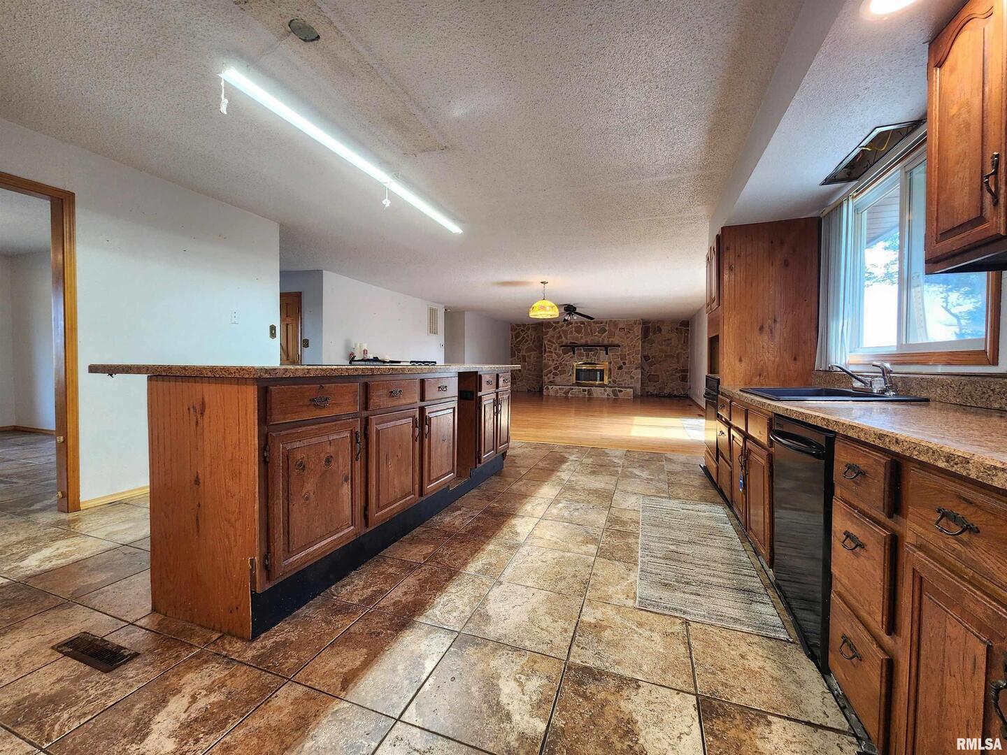 10107 Sugar Creek Road Benton, IL 62812 - Photo 12 of 43 a large kitchen with stainless steel appliances granite countertop lots of counter top space