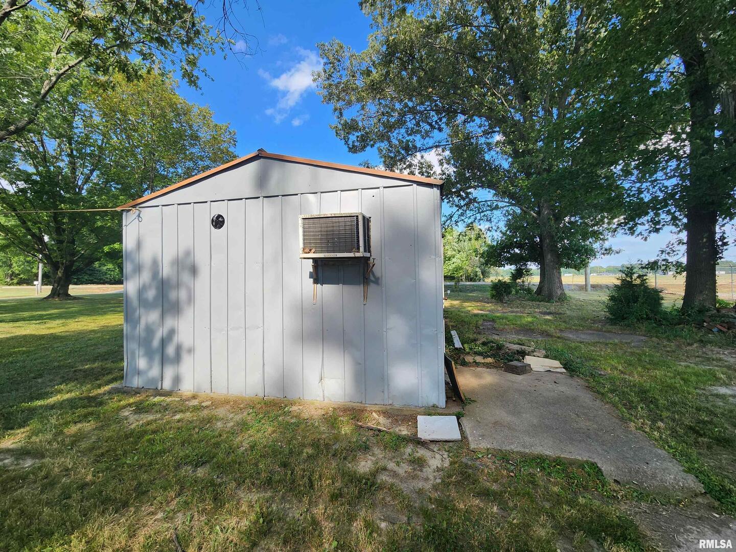 10107 Sugar Creek Road Benton, IL 62812 - Photo 35 of 43 a front view of a house with garden