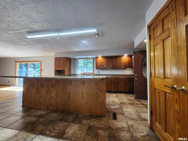 a view of a kitchen with a sink