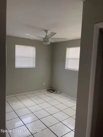a bathroom with a blue tub